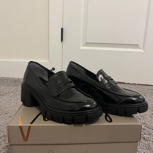 Black faux leather loafers